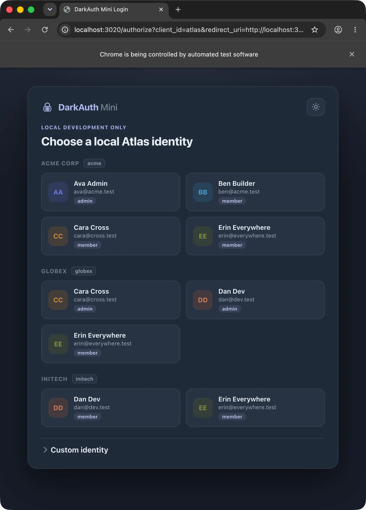 The DarkAuth Mini login screen in dark mode, showing demo users grouped by organisation